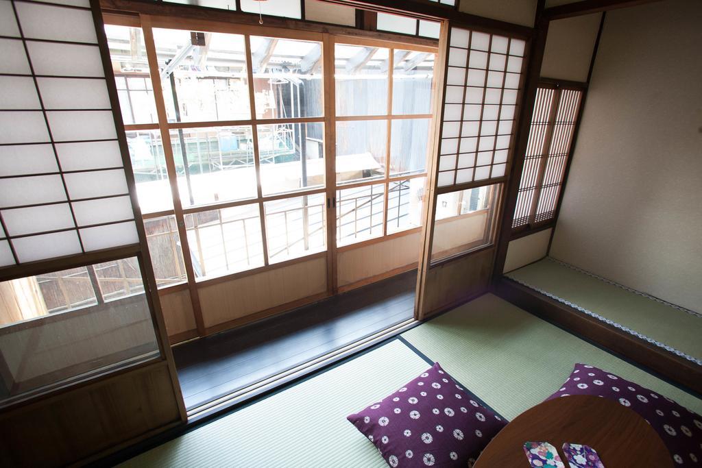 Guesthouse Omotenashi Kyoto Bagian luar foto