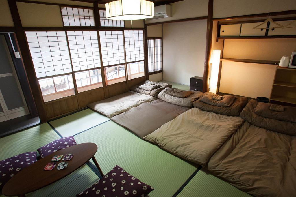 Guesthouse Omotenashi Kyoto Bagian luar foto