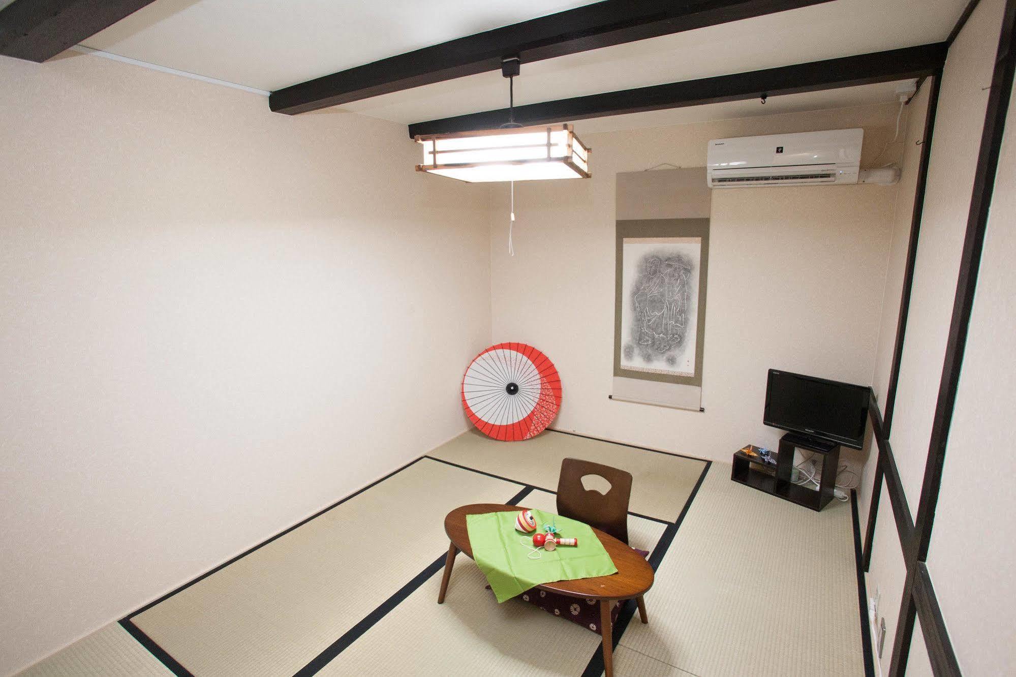 Guesthouse Omotenashi Kyoto Bagian luar foto