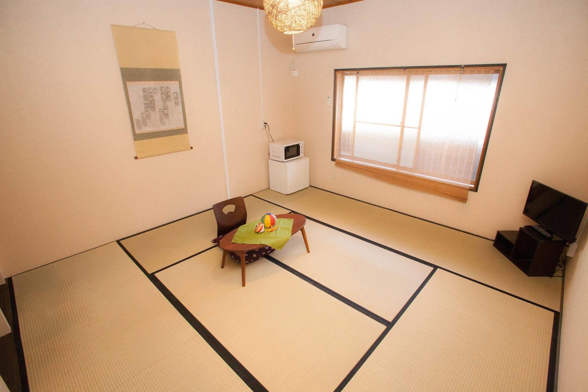 Guesthouse Omotenashi Kyoto Bagian luar foto